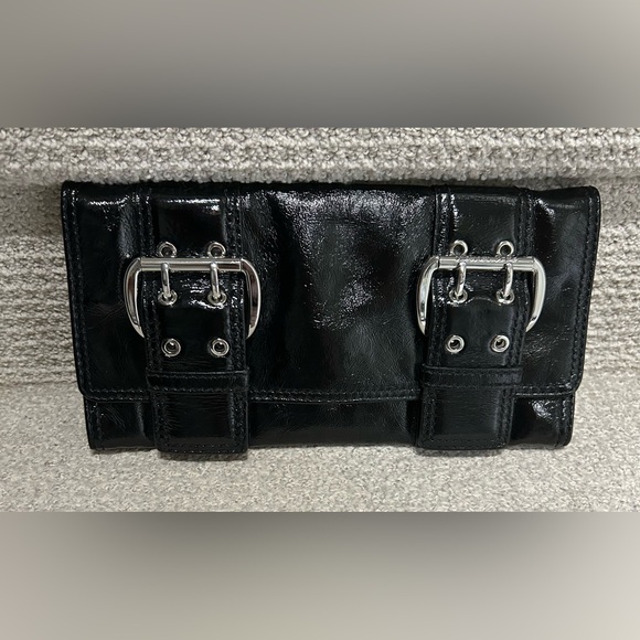 Michael Kors Handbags - ✨ LIKE NEW ✨ Michael Kors Black Patent Leather Double Buckle Clutch